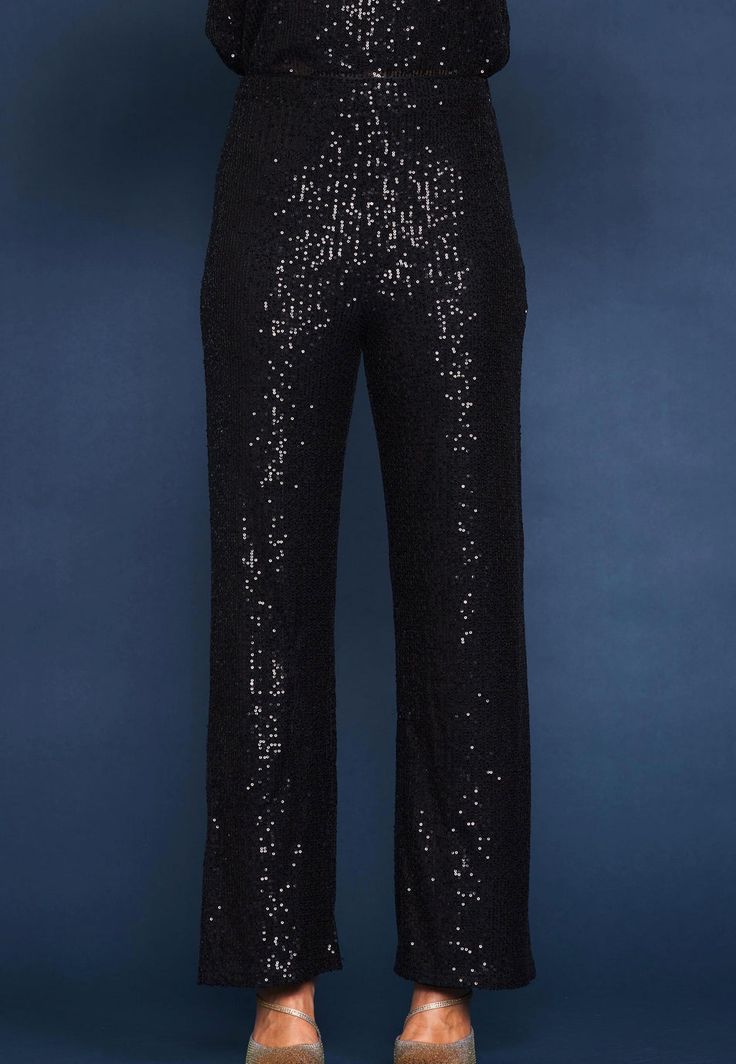 Elevate your wardrobe with our Black Sequin Pants. The classic chic design combined with just the right amount of bling will add a touch of luxury to any outfit. Take your style to the next level and stand out from the crowd. Crafted with meticulous detail, these pants are sure to make a statement. Available in XSmall, Small, Medium, Large and XLarge Runs true with stretchy lining Black Sequin Pants, Sequin Pants, Holiday Ready, Classic Chic, Sequin Fabric, Velvet Tops, Black Sequins, Chic Design, Next Level