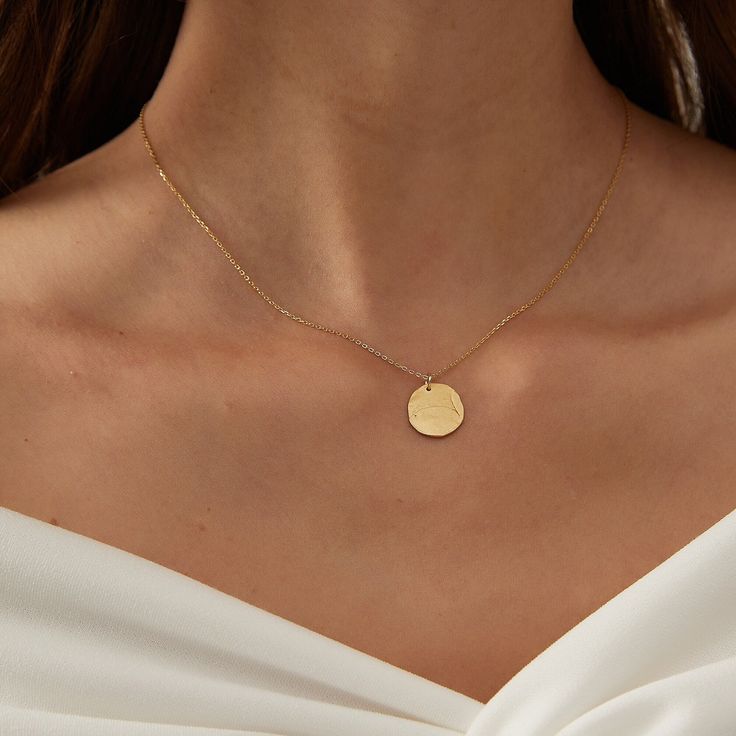 "H A M M E R E D ∙  C I R C L E  ∙ N E C K L A C E - 16.5\" Our exquisite Dipped Hammered Circle Disc Pendant Dainty Necklace is finished in sterling silver with 24K Gold plated. This elegant piece is perfect for adding a touch of sophistication to any outfit. The delicate design features a hammered circular disc pendant, exuding charm and uniqueness. Crafted from high-quality sterling silver, this necklace is sure to withstand the test of time. Elevate your style with this stunning accessory th Gold Circle Pendant Necklace, Small Gold Round Pendant Necklace, Pendant Necklace Aesthetic, Jessica Stanley, Gold Necklace Pendant, Gold Circle Necklace, Circle Jewelry, Necklace With Pendant, Gold Pendant Jewelry