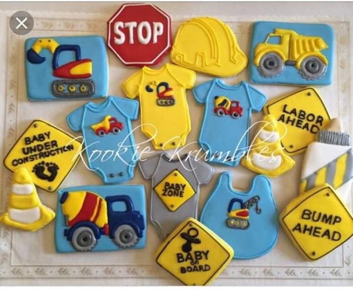 baby shower cookies decorated with construction themed icing