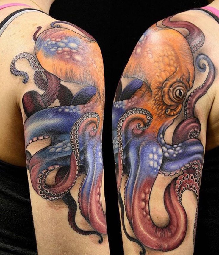 an octopus tattoo on the arm and shoulder is painted in blue, orange, and red