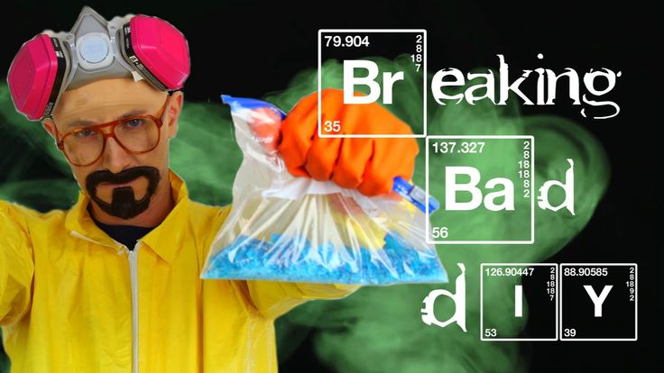 a man in yellow jacket holding up a bag with an orange substance on it and the words breaking bad diy