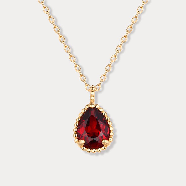 This Garnet Morning Dew Necklace is a luxurious piece crafted to perfection from gleaming gold set on a sleek silver base. Perfect for any occasion, this necklace is the ideal statement piece to elevate your look and add a touch of timeless elegance. An exquisite accessory for any wardrobe, the Garnet Morning Dew Necklace will easily become your go-to for day-to-day wear or special occasions. DETAILS Plating:  9 K Gold  Materials:  9 K Gold on Silver, Natural Mozambique Garnet Measurements :   L Elegant Drop Birthstone Necklaces, Elegant Red Jewelry With Delicate Chain, Formal Drop Necklace With Birthstone, Elegant Drop Birthstone Necklace, Elegant Birthstone Drop Necklace, Elegant Drop Shape Birthstone Necklace, Formal Teardrop Pendant Gemstone Necklace, Formal Teardrop Gemstone Pendant Necklace, Classic Clavicle Chain Necklace As A Gift For Her