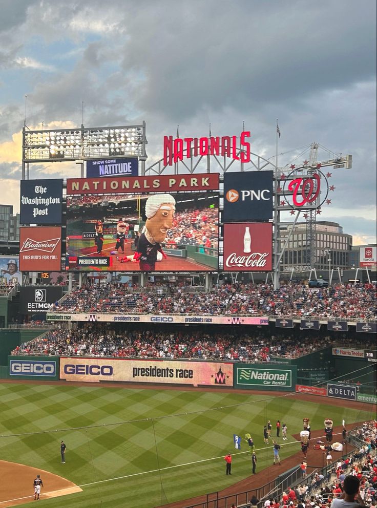 a baseball stadium filled with lots of people