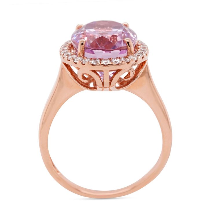 Crafted in the subtle yet luscious glow of 14K rose gold, this ring stands out owing to its lovely pink tone. Embellished with a charming oval cut Kunzite, the artistic design of this fine jewelry gives it an elegant look. Accentuated by the glitter of the round cut Diamonds. Product Information SKU 10319 Metal Type 14K Metal Color Rose Gold Ring Style Halo Primary Stone Gemstone Name Kunzite No. Of Gemstones 1 Gemstone Shape Oval Gemstone Weight 8.44 Gemstone Size 14x10 mm Secondary Stone Gemst Luxury 14k Rose Gold Rings With Halo Setting, Luxury 14k Rose Gold Halo Setting Rings, Luxury 14k Rose Gold Oval Rings, Luxury Oval Rose Gold Diamond Ring, Elegant Pink Gold Morganite Rings, Elegant 14k Rose Gold Jewelry With Halo Setting, Luxury Rose Gold Rings With Halo Setting, Elegant Cushion Cut Rose Gold Diamond Ring, Elegant 14k Rose Gold Ring With Halo Design