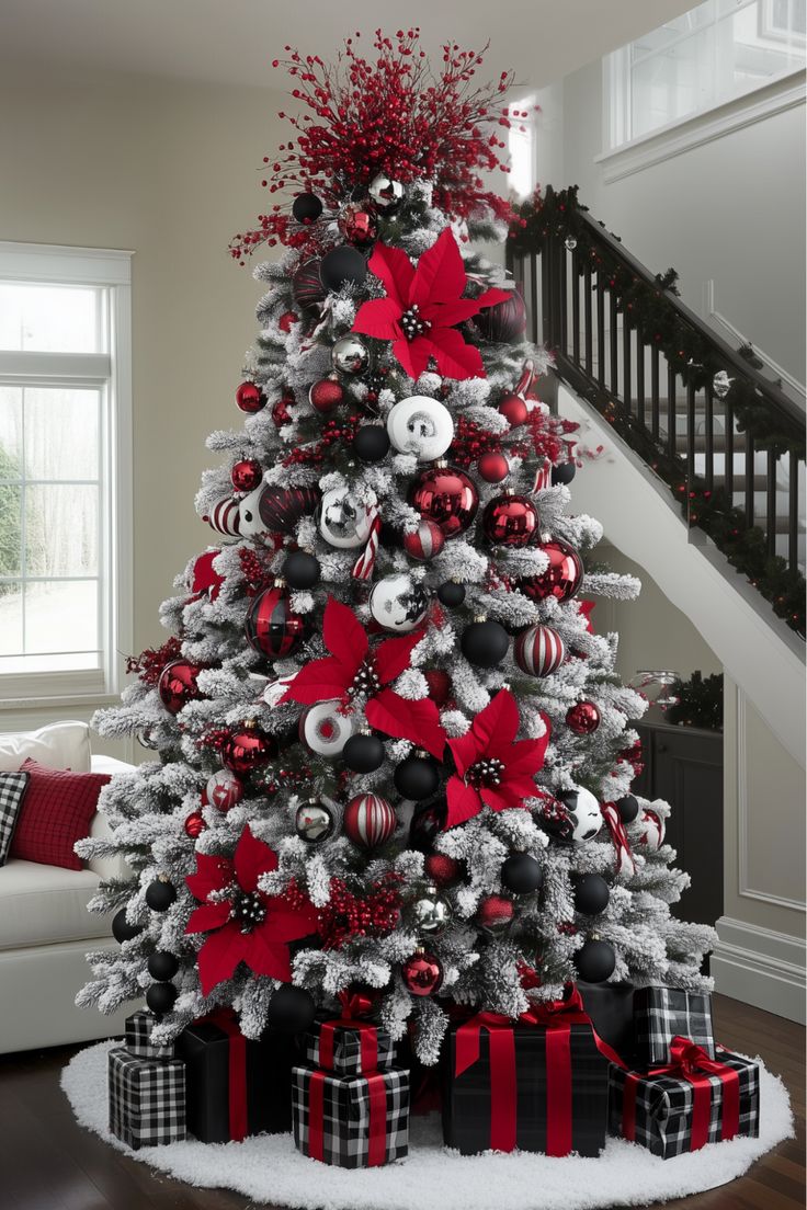 Looking for something bold and modern? A white Christmas tree with red and black is a sophisticated twist on tradition. Matte black and glossy red ornaments add depth, while the white base keeps it fresh. What do you think of this moody yet festive vibe? It’s perfect for those who love a little edge in their holiday decor. White Black And Red Christmas Tree, Black White Red Silver Christmas Decor, Christmas Tree Ideas Black And Red, Red White And Black Christmas Tree Ideas, Christmas Ornaments Color Scheme, Black Red White Christmas Tree, Red White Black Christmas Tree, Red Black White Christmas Tree, White Christmas Tree Color Schemes