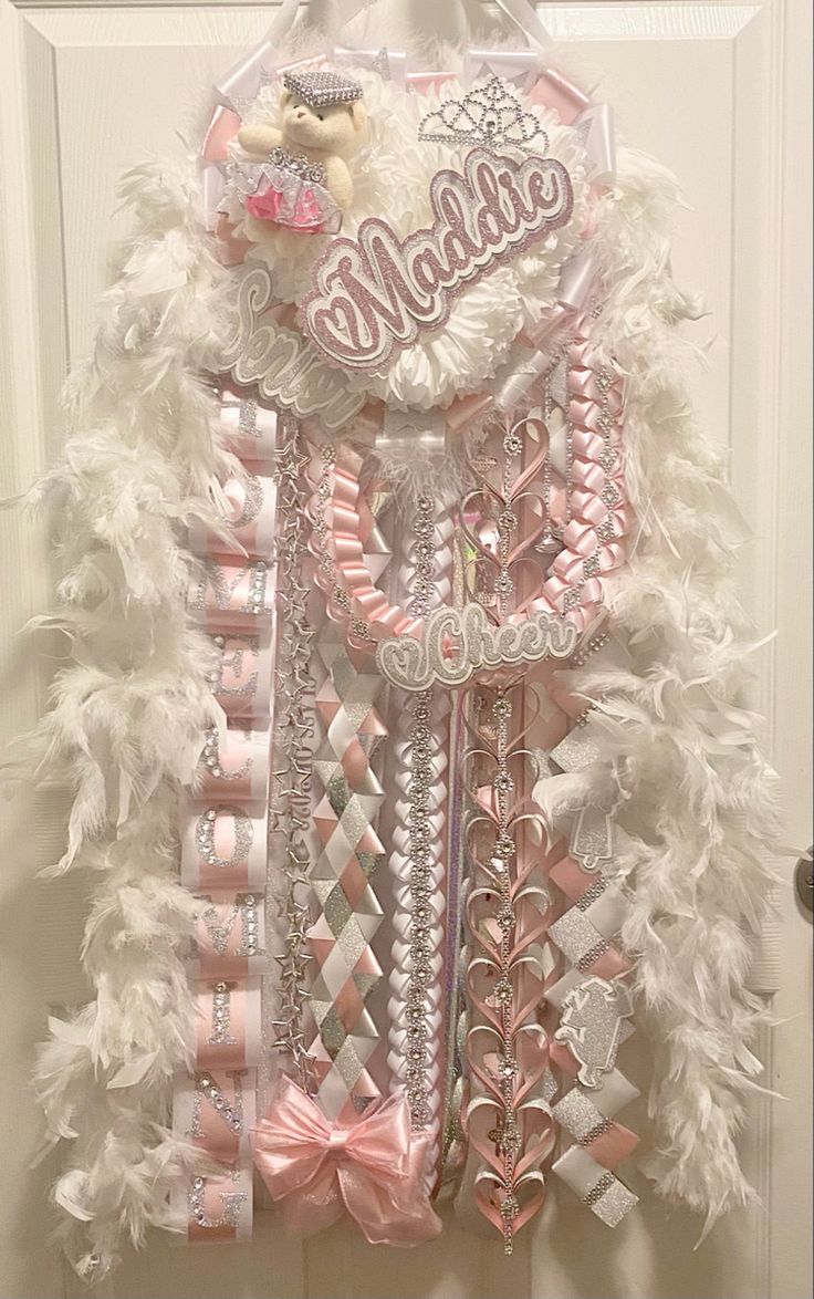 hoco mum
senior mum
senior homecoming mum
homecoming mum
mega mum 
white and silver homecoming mum
pink homecoming mum Homecoming Jeans Ideas, Senior Painted Jeans, Big Mum, Homecoming Mums Ideas, Big Homecoming Mums, Unique Homecoming Mums, Senior Crown Ideas, Homecoming Mums Senior, Senior Hoco