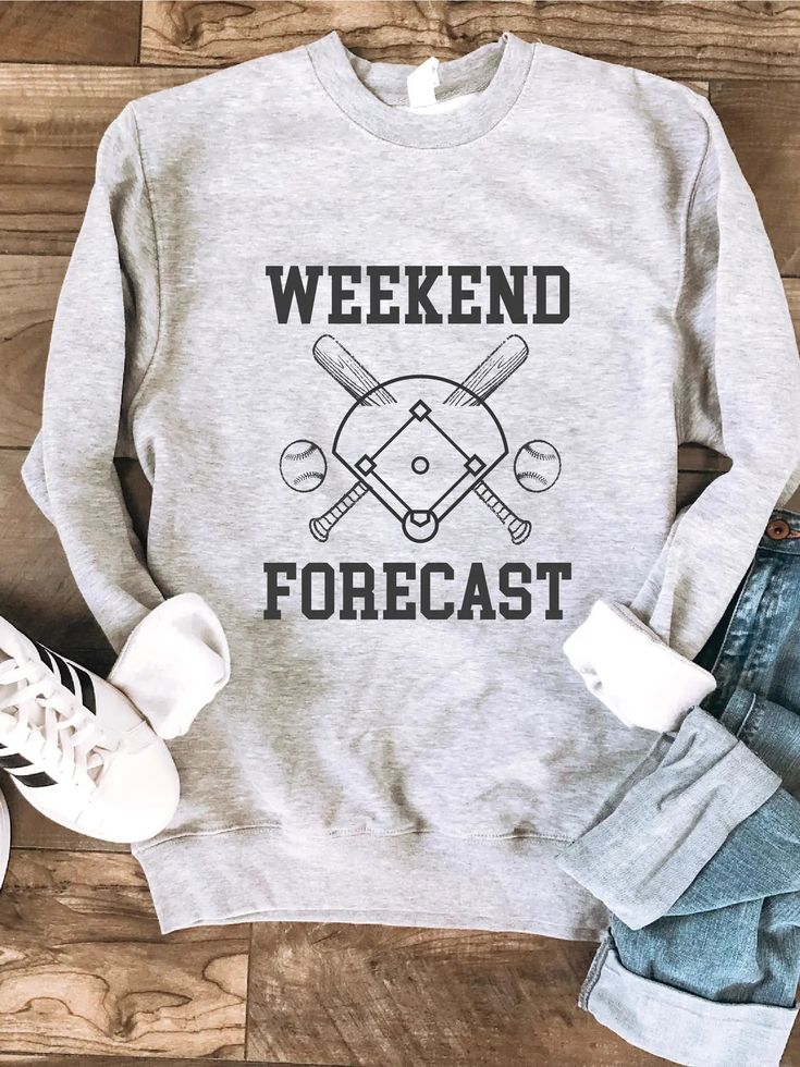 a sweatshirt with the words weekend forcast on it and two tennis rackets next to it