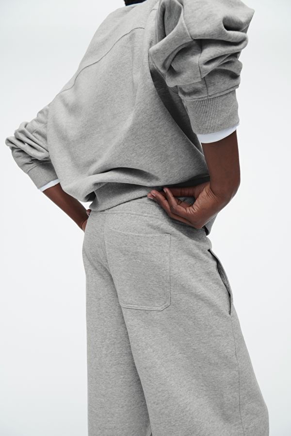 BARREL-LEG JOGGERS - GREY MÉLANGE - COS Comfortable Gray Sweats With Ribbed Cuffs, Heather Grey Sweats With Ribbed Cuffs, Relaxed Fit, Heather Grey Relaxed Fit Sweats With Ribbed Cuffs, Gray Cotton Activewear With Relaxed Fit, Gray Relaxed Fit Cotton Activewear, Everyday Gray Sweats With Ribbed Cuffs, Casual Gray Sweats With Ribbed Cuffs, Comfy Gray Sweats With Relaxed Fit, Gray Relaxed Fit Comfy Sweats