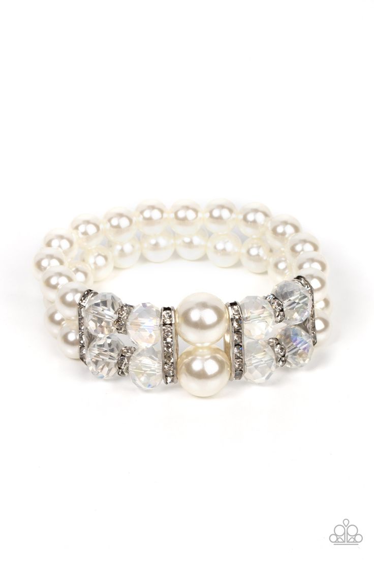 Held together by white rhinestone encrusted silver frames, a stretchy pair of bubbly pearl bracelets are infused with white rhinestone encrusted silver rings, iridescent crystal-like beads, and oversized white pearls for a timeless finish.

Sold as one individual bracelet. Shopping Boutique, White Pearl Bracelet, White Bracelet, Pearl Bracelets, Feeling Pretty, Iridescent Crystal, Jewelry Bracelets Silver, Mixed Metal Jewelry, White Bracelets