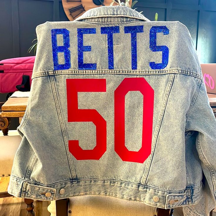 I Can Add Rhinestones The Number Size Large I Can Make Any Team Logo! Just Ask(: Cheer Jean Jacket, Football Mom Outfit, Football Girlfriend Shirts, Jean Jacket Design, Jean Jacket Diy, Preppy Jacket, Football Girlfriend, Jean Jacket Patches, Custom Jean Jacket