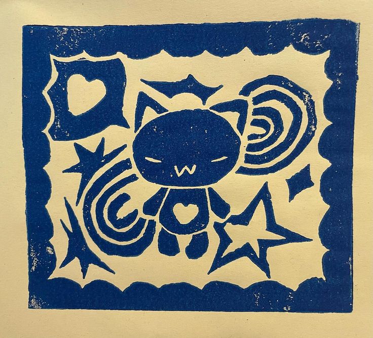 a blue and white drawing of a cat with stars on it's back ground