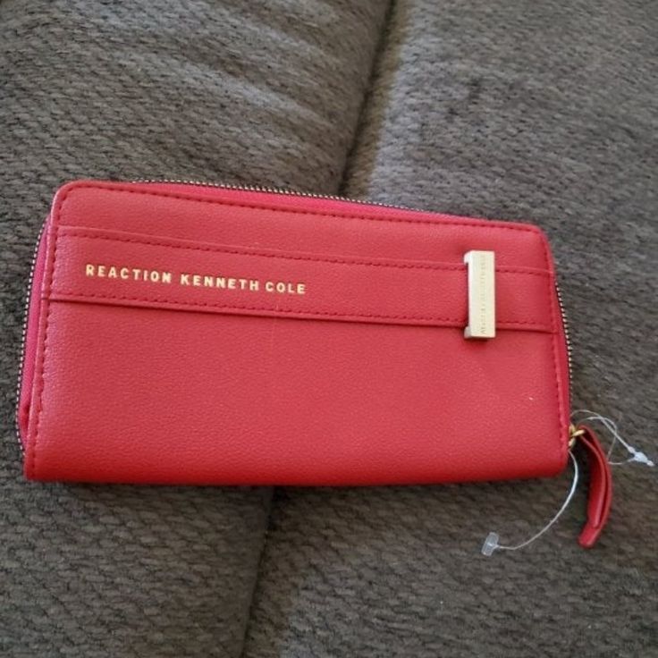 Reaction Kenneth Cole Womens Red Man Made Zip Around Wallet. Has Zippered Change Slot, Bill Slots And Credit Card Slots. Brand New Without Tag. 100% Authentic Trendy Red Wallet With Zipper Closure, Chic Red Wallet For Everyday Use, Chic Red Everyday Wallet, Casual Red Travel Wallet, Super Glow, Womens Wallet, Brown Wallet, Pocket Wallet, Genuine Leather Wallets