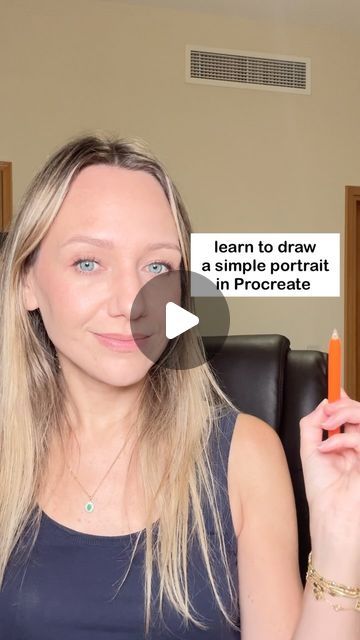 a woman holding an orange object in front of her face with the caption learn to draw a simple portrait