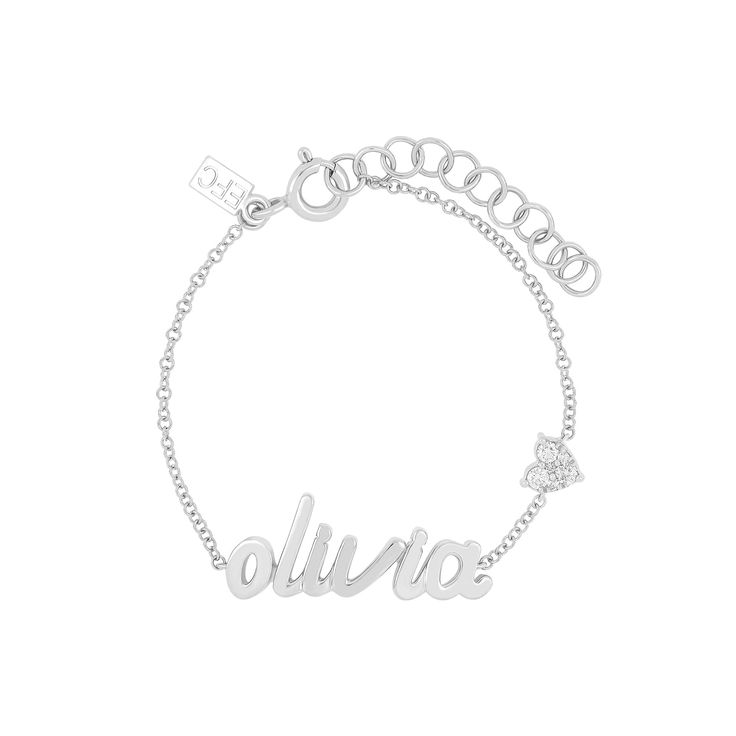 The You Have My Heart Script Name Bracelet was originally created to welcome Emily's beautiful baby girl, Olivia. Featuring your choice of 1-10 gold script letters and our signature heart motif with full-cut diamonds, this custom, one-of-a-kind bracelet comes in two sizes for either baby or mama. Personalized Elegant Sterling Silver Heart Bracelet, Classic White Gold Heart Bracelet As Gift, Elegant White Gold Charm Bracelet For Mother's Day, Elegant Personalized Heart Bracelet With Name, Personalized Silver Heart Bracelet, Elegant Sterling Silver Name Bracelet With Initials, White Gold Initials Bracelet For Anniversary, Elegant Sterling Silver Initials Name Bracelet, Dainty Engraved Name Bracelet For Personalized Gift