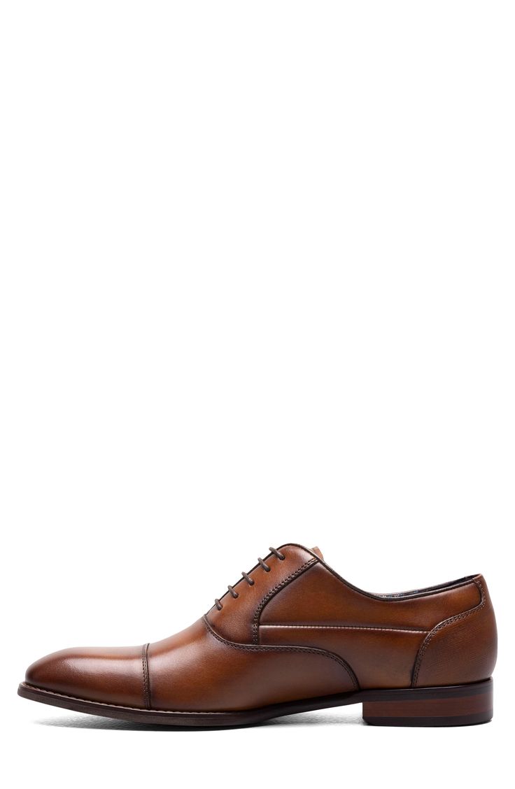 A squared cap toe and polished leather lend modern sophistication to a sleek oxford set on a well-cushioned footbed for optimal support. Removable, cushioned insole with arch support Leather upper/textile lining/rubber sole Imported Timeless Brown Oxfords For Business Casual, Cognac Leather Cap Toe Shoes For Derby, Fitted Brown Oxfords For Derby, Fitted Brown Cap Toe Oxfords, Timeless Brown Derby Shoes For Office, Fitted Oxfords With Rubber Heel Cap For Business, Business Oxfords With Rubber Heel Cap, Brown Dress Shoes With Rubber Heel Cap For Derby, Classic Brown Oxfords For Office