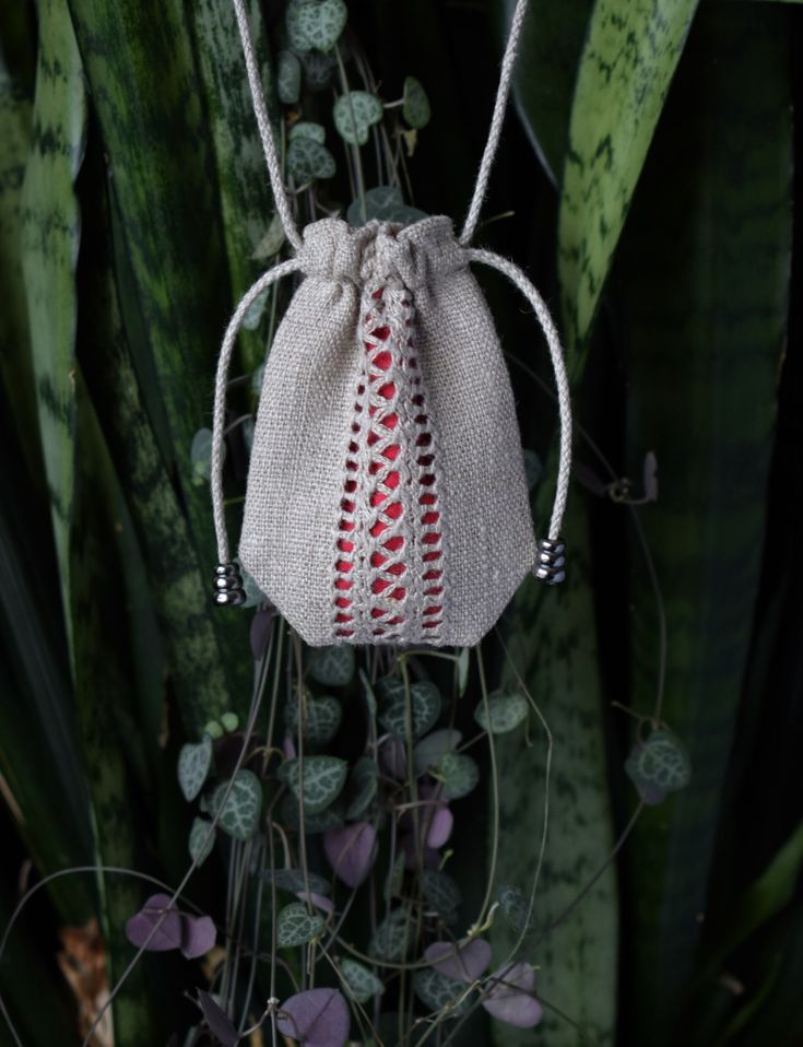 Hand embroidered natural linen neck pouch with drawstring closing is perfect for caring your special healing stone or crystals around your neck.  Also use this as the coin purse or vegan medicine bag. This little pouch necklace is handmade with natural flax linen fabric and cotton. Fully lined with cotton lining in red, red orange, orange, yellow, purple, red-violet, blush or lilac.  The cord is sturdy yet soft flax linen cord which holds the content securely. The pouch itself measures 6.5 cm wi Medicine Bag Necklace, Pouch Necklace, Neck Pouch, Bag Necklace, Medicine Pouch, Crystal Holder, Medicine Bag, Red Violet, Christmas Gift Bags