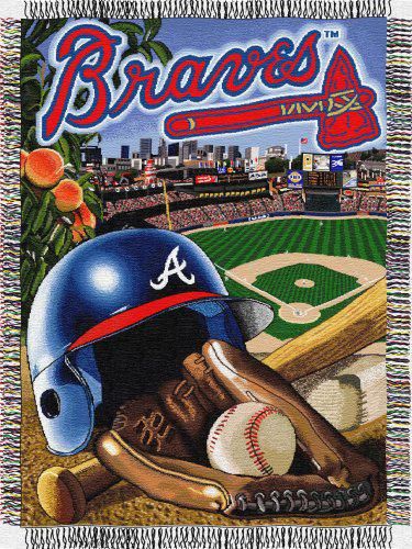 the atlanta braves throw blanket with a baseball and glove on it