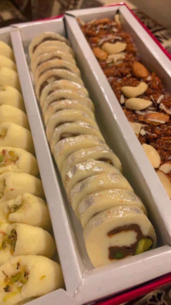 three trays filled with different types of desserts and pastries in each one