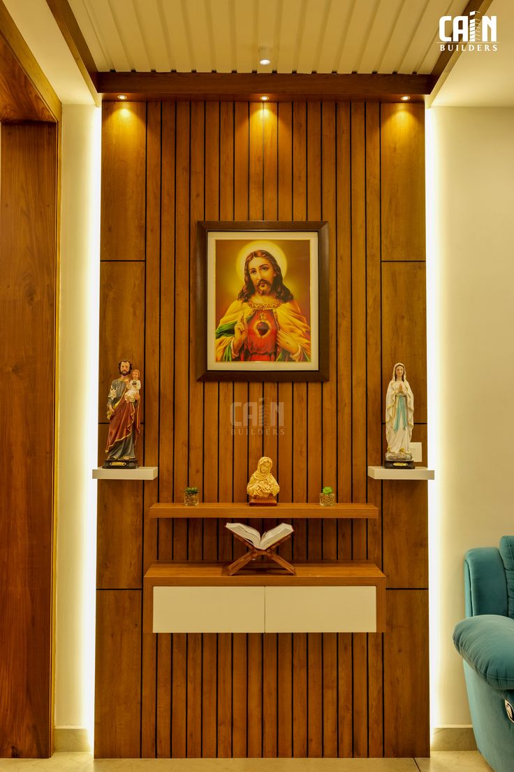 a living room with wooden paneling and a painting on the wall next to a blue chair