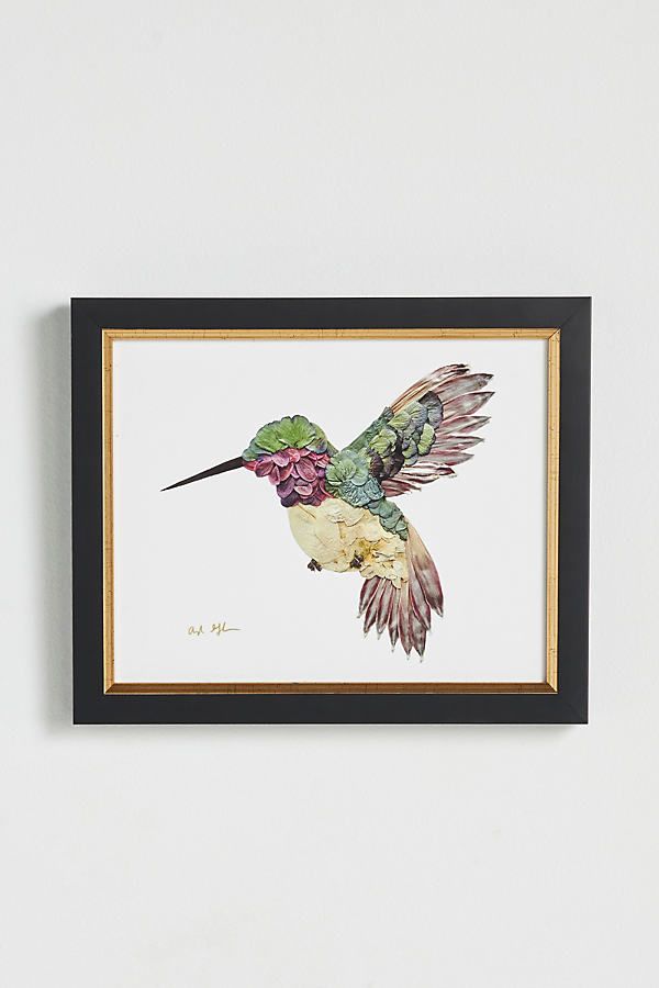 a painting of a hummingbird flying in the air