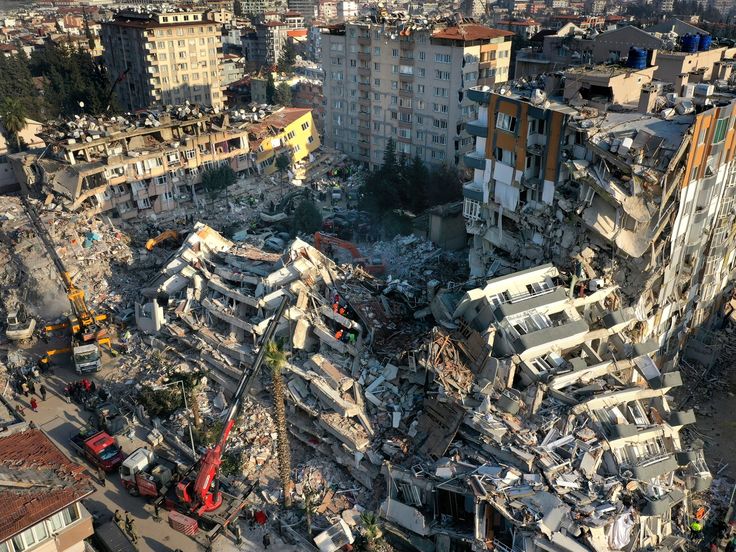 an aerial view of destroyed buildings in the city