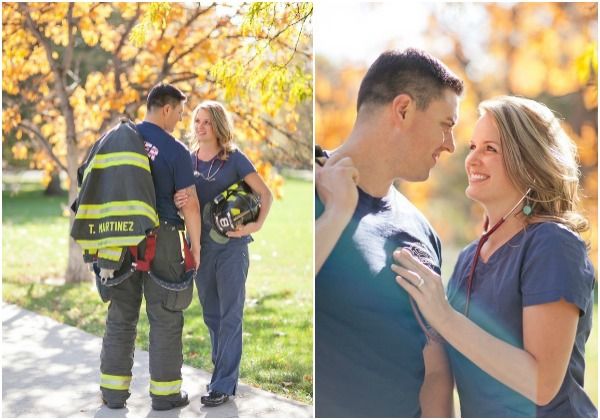 two fire fighters are talking to each other while the woman is holding her arm around the man's shoulder