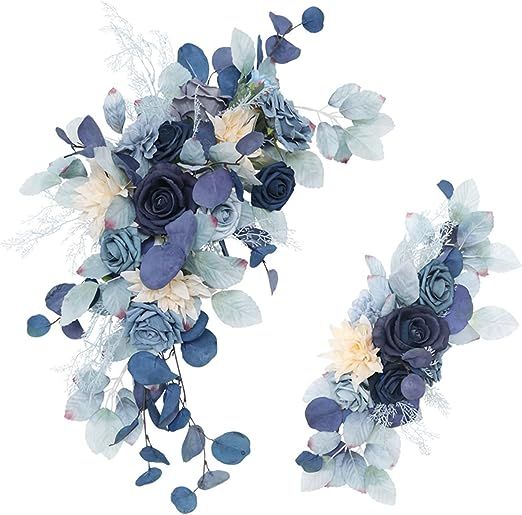 two blue and white flowers are arranged on the same piece of articulation foliage