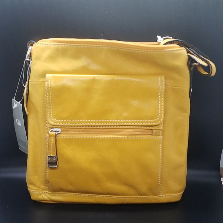 Yello Leather Bag Travel Yellow Satchel, Yellow Bag With Detachable Strap For On-the-go, Yellow Travel Bag With Detachable Strap, Yellow Satchel With Detachable Strap For On-the-go, Yellow Satchel Bag For On-the-go, Yellow Rectangular Shoulder Bag With Adjustable Strap, Yellow Satchel With Adjustable Strap For Travel, Yellow Pouch Shoulder Bag For On-the-go, Yellow Canvas Shoulder Bag With Adjustable Strap