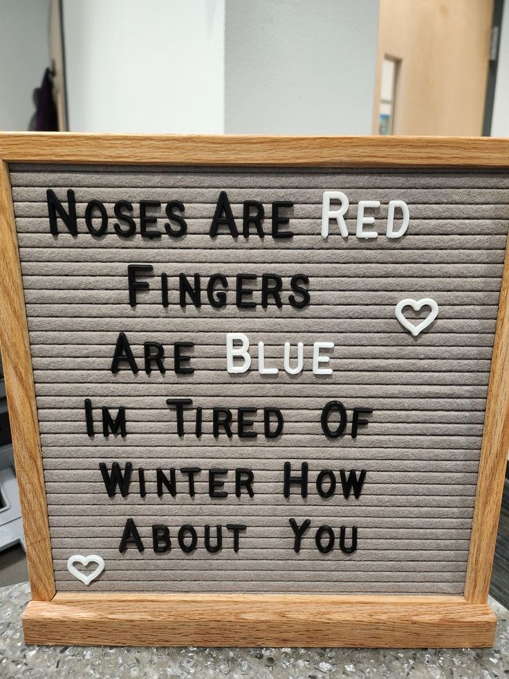 a sign that says roses are red fingers are blue i'm tired of winter how about you?