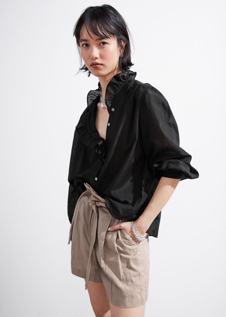 Long-sleeve blouse traced with frilled detailing along the collar and upper lapel. • Three button closures• Buttoned cuffs• Length of top:66cm / 26" (Size S) Frill Blouse, Silk Button Up, Swimwear Shorts, Clothing Essentials, Fashion Story, Fall 2024, Short Jacket, Trouser Jeans, Cotton Silk