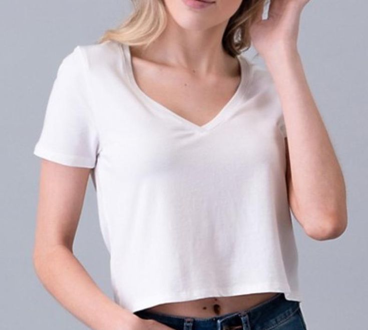 Solid, v-neck, short sleeve, crop top. 80% Rayon 15% Cotton 5% Spandex