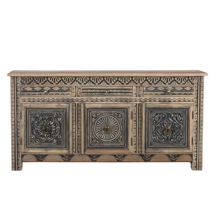 an ornately decorated sideboard with four doors and carvings on the front, against a white background