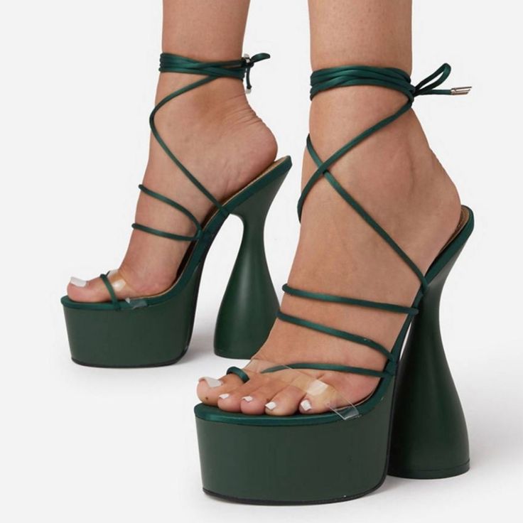 Strappy Style Tuesday Fastening Toe Post Platform Sole High Flared Heel Lining: 100% Polyurethane Sole 100% Plastic Upper 100% Polyurethane Color: Dark Green Size: Uk 6 And Usa 8 Condition: Brand New ( A Small Black Mark On Left Shoe, See Picture) Same/ Next Day Shipping. Offers Are Always Welcome! Lace-up Platform Sandals In Synthetic Material, Round Toe Sandals With Strap, Synthetic Sandals With Strap And Round Toe, Beach High Heel Lace-up Synthetic Sandals, Lace-up Synthetic Wedge Sandals For Party, Synthetic High Heel Lace-up Sandals With Wrapped Heel, Platform Lace-up Sandals For Vacation, Synthetic Closed Toe Lace-up Sandals For Party, Synthetic Platform Lace-up Sandals For Vacation