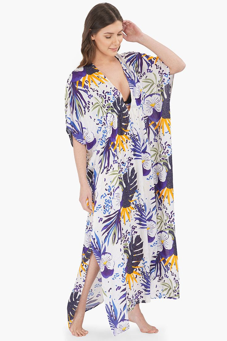 Kaftan Dress V-neckline Drawstring tie at waist Blue tropical print all over Loose and comfortable fit Made in soft viscose fabric Let the sun shine, let the flowers bloom, let the rainbow gleam through! None of it can hold a candle to our beautiful tropical twilight cover up.Is it time for the vacay you have been waiting for since ages. Bro Tip? Pack this sexy, comfy and sassy kaftan and you're set to take the flight off!Pair this piece with an adorable pair of slip-on sandals and the chicest s Twilight Cover, Leopard Bag, Sun Shine, Vacation Looks, Flowers Bloom, The Spa, Kaftan Dress, Viscose Fabric, Bag Dress