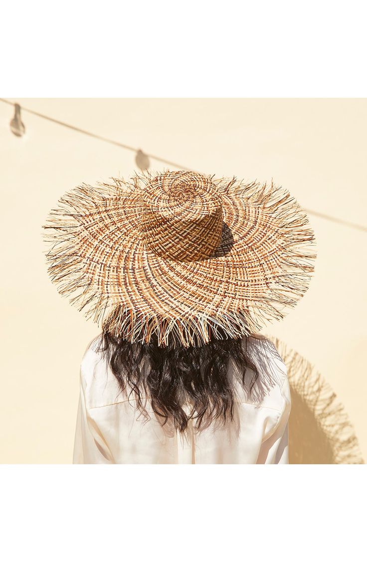 You'll look vacation-ready in this wide-brimmed sun hat crafted from multicolored palm straw. Palm straw Spot clean Made in the USA of imported materials Wide Brim Straw Boater Hat For Vacation, Vacation Wide Brim Straw Boater Hat, Flat Brim Straw Hat For Pool And Summer, Multicolor Woven Straw Hat For Beach Season, Natural Handwoven Sun Hat For Spring, Straw Boater Hat With Flat Brim For Vacation, Spring Natural Handwoven Sun Hat, Spring Natural Color Handwoven Sun Hat, Woven Paper Straw Hat For Beach Season