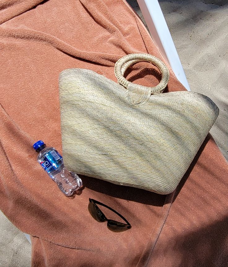 Meet you new summer bag. This large woven farmers market bag with handle is perfect to take to beach or to market. Its versatile and trendy. Measures 21" x 13" Add pompom and make it unique. ( Pompom shown in this picture is just sample not included with bag.) Handmade in Mexico. Sand-colored Straw Bag For Summer Beach, Beachy Sand-colored Beach Bag With Braided Handles, Spring Beach Sand-colored Straw Bag, Summer Sand-colored Straw Bag, Basket Beach Bag Made Of Natural Fiber For Vacation, Summer Beach Shoulder Bag Made From Palm Leaf, Sand Color Straw Bag For Beach Season, Spring Beach Bag In Sand Color, Sand-colored Straw Bag For Beach Season Vacation