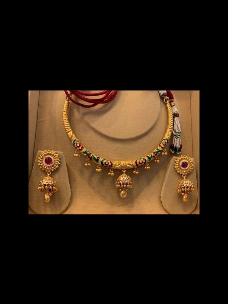 Pure gold Hasli necklace with jhumka earings🔥 #rajputijewellery #rajasthanijewellery #hasli #rajputihasli #haslidesign #illustriousdesigns Hasli Necklace Gold Jewellery, Rajputi Hasli Design, Hasli Gold Design, Hansli Necklace Design, Gold Hasli Necklace, Rajputi Gold Necklace, Rajputi Jewellery Earing, Hansuli Necklace Gold, Hansli Necklace Gold