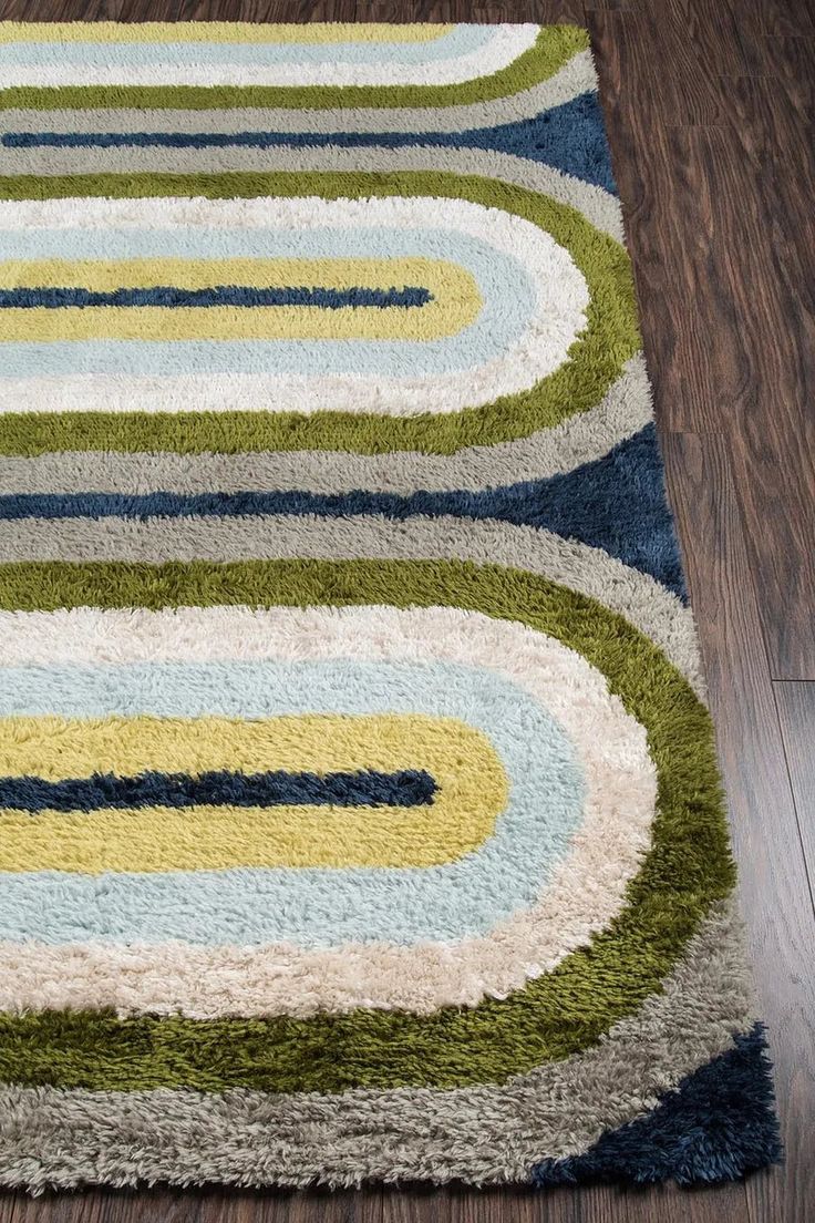 an area rug with various colors and shapes