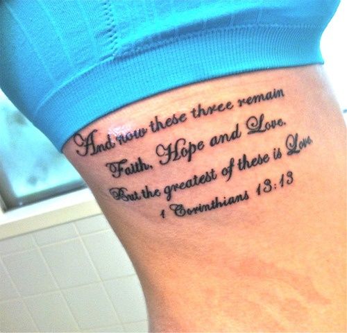 a woman with a tattoo on her thigh that says, and you are there remain faith hope and love