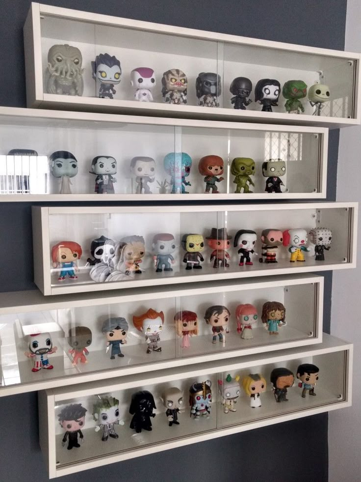 the shelves are filled with different kinds of pop vinyls