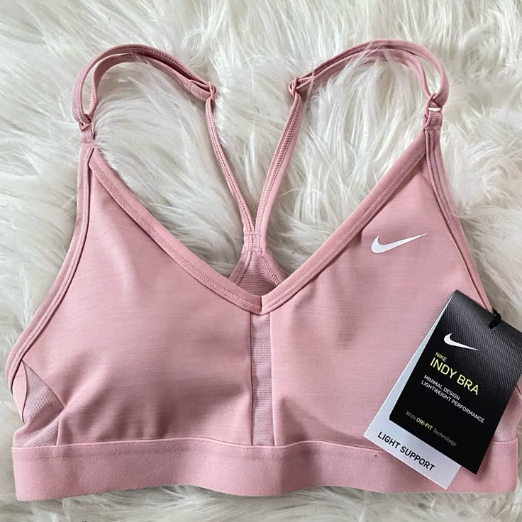 Size Xs Color: Pink New With Tags Has Adjustable Straps Light Support With Padding Lightweight With Mesh Detailing Super Cute & Perfect For Workouts - Message Me With Any Questions #Sportsbra #Nikebra #Nikepro #Nikesportsbra #Athleisure Pink Sportswear Activewear For Loungewear, Fitted Pink Sports Bra With Light Support, Nike Seamless Activewear For Light Exercise, Pink Fitted Sports Bra With Light Support, Pink Seamless Tops For Training, Pink Stretch Sports Bra With Light Support, Pink Activewear With Light Support For Training, Pink Activewear For Sports Season Training, Pink Sports Bra For Spring Workout