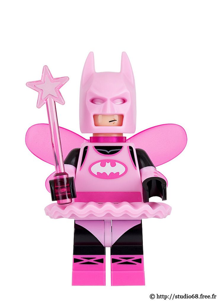 a pink batgirl minifigure holding a star