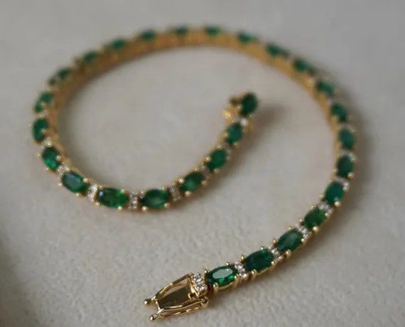 Emerald Diamond Bracelet, Emerald Bracelet Diamond, Emerald Green Diamond Bracelet, Elegant Green Emerald Tennis Bracelet, Luxury Green Emerald Tennis Bracelet, Luxury Gold Bracelets With Emerald, Formal Green Emerald-cut Tennis Bracelet, Emerald Tennis Bracelet, Emerald Green Jewelry