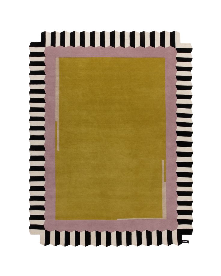 an area rug with black and white stripes on the bottom, pink border around the edges