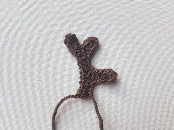 a small crocheted animal made out of yarn