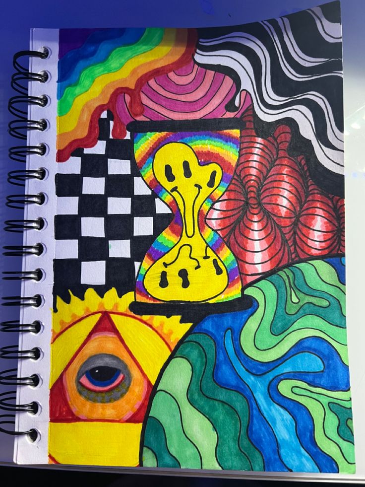 a spiral notebook with an abstract painting on it