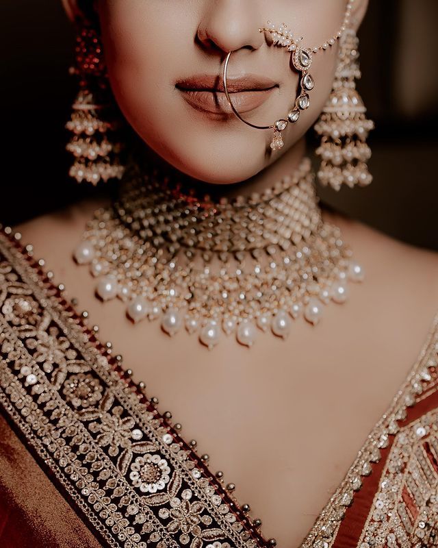 Latest Bridal Nath Designs For Indian Brides Bridal Nath Designs, Nath Designs, Nath Bridal, Bridal Nath, Indian Brides Jewelry, Nose Ring Designs, Nose Jewels, Bridal Ornaments, Nath Nose Ring