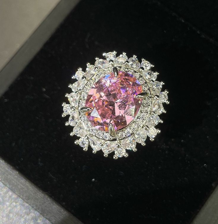 ✰ This delicate lab-created pink gift ring is perfect for people who want to achieve a brilliant and splendid look ✰  Not only for everyday wear, this dainty pink cz ring is also great for weddings and also as a bridesmaid ring ✰ This oval cz ring pink is a very special gift for birthday, Mother's Day, bridesmaids, Valentine's Day and more  ✰ Comes with an exquisite gift box We also offer the necklace and earring from the same collection:  https://www.etsy.com/listing/1222004885/vintage-pink-oval-necklace-pink-zircon https://www.etsy.com/listing/1222001683/pink-drop-earring-with-halo-oval-zircon Materials: Environmentally-friendly brass Quantity: 1 Piece Ring Size: 0.85 x 0.8 in Main Gemstone Size: 0.47 x 0.4 in ----♛ PRODUCTION & SHIPPING ♛ --- ✰Multiple items purchased in one payment can Pink Crystal Promise Ring With Prong Setting, Pink Diamond Promise Ring With Halo Design, Luxury Pink Oval Diamond Ring, Formal Pink Halo Design Ring, Fine Jewelry Pink Diamond Ring, Fine Jewelry Pink Crystal Wedding Ring, Pink Crystal Ring For Wedding, Fine Jewelry, Pink Crystal Ring With Halo Setting For Wedding, Pink Fine Jewelry Crystal Ring For Wedding