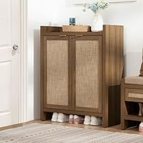 a wooden cabinet sitting next to a white door