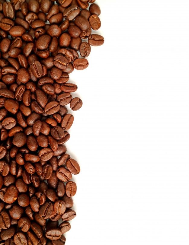 coffee beans are scattered on top of each other